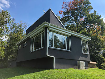 House with window roller shutters