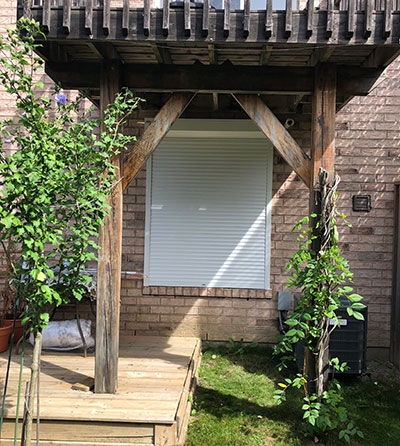 backyard window with shutter